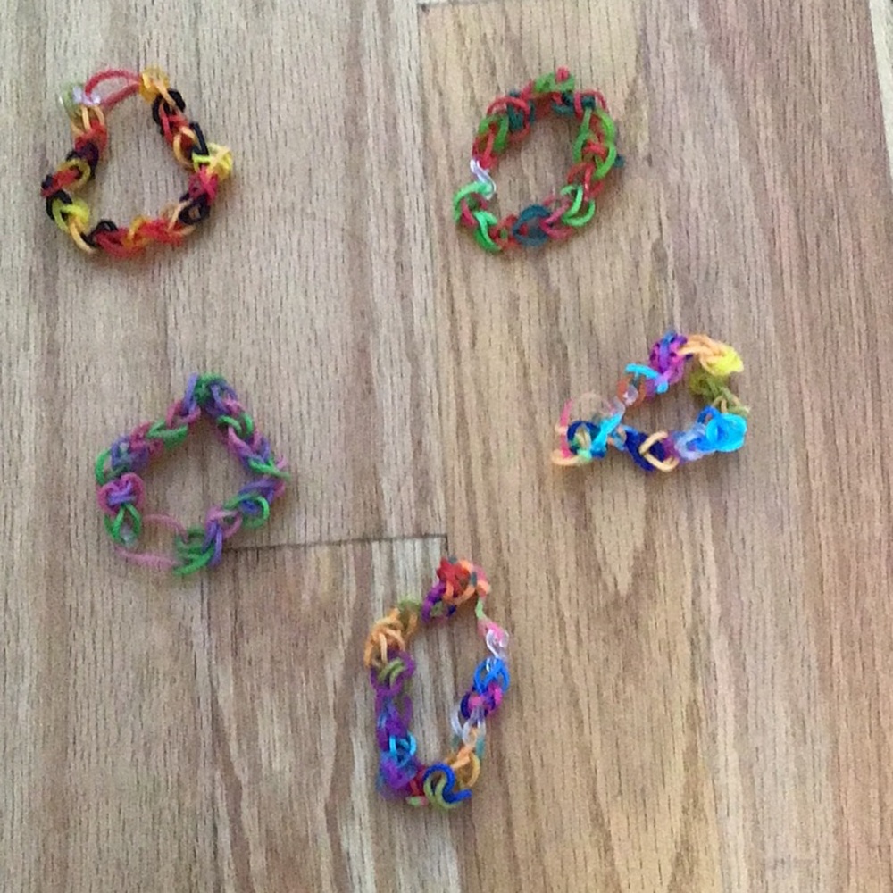 I am selling 5 rainbow loom bracelets!They are stretchy!Made with care and love!